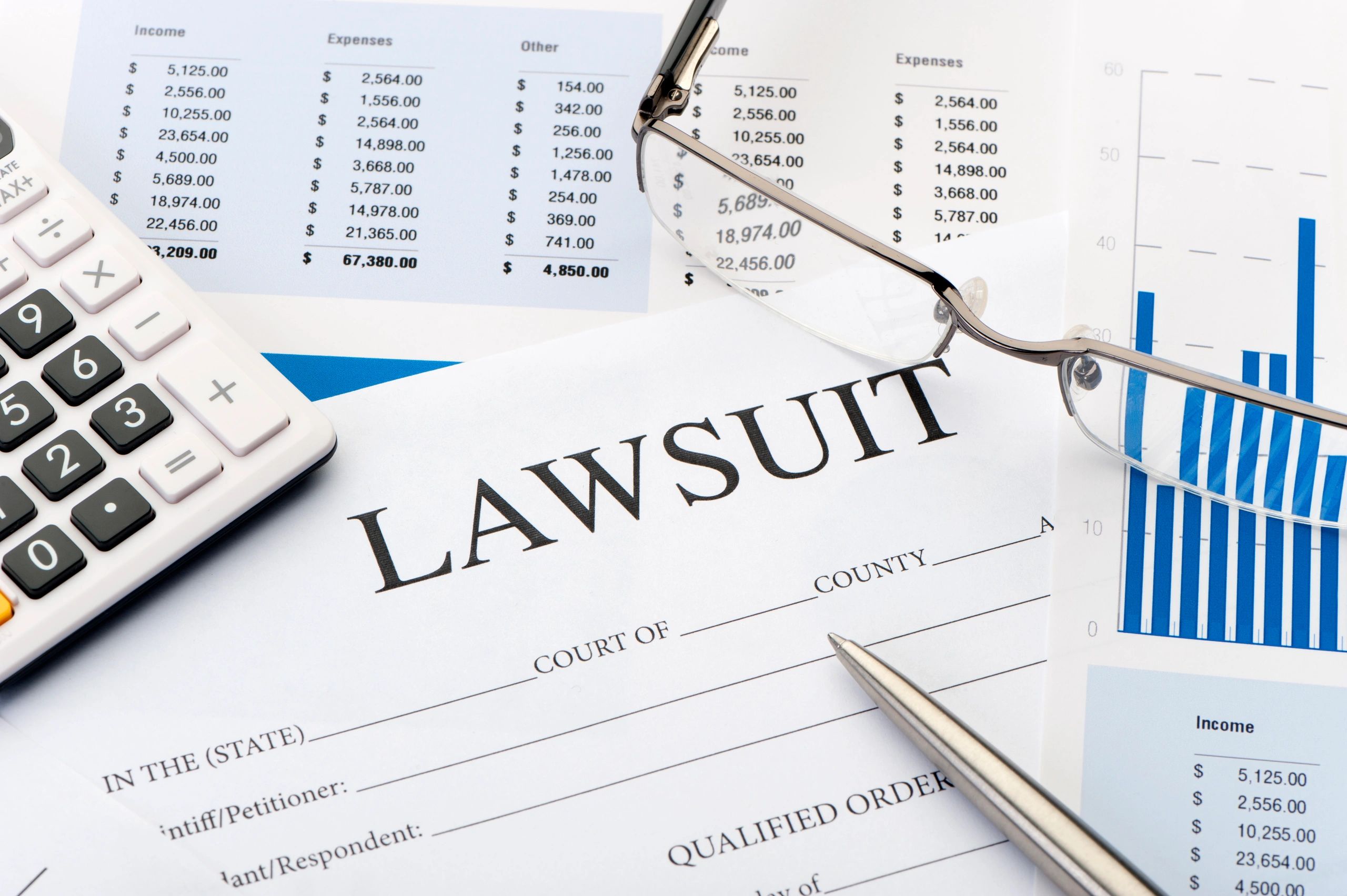 Legal documents and pen on a desk
